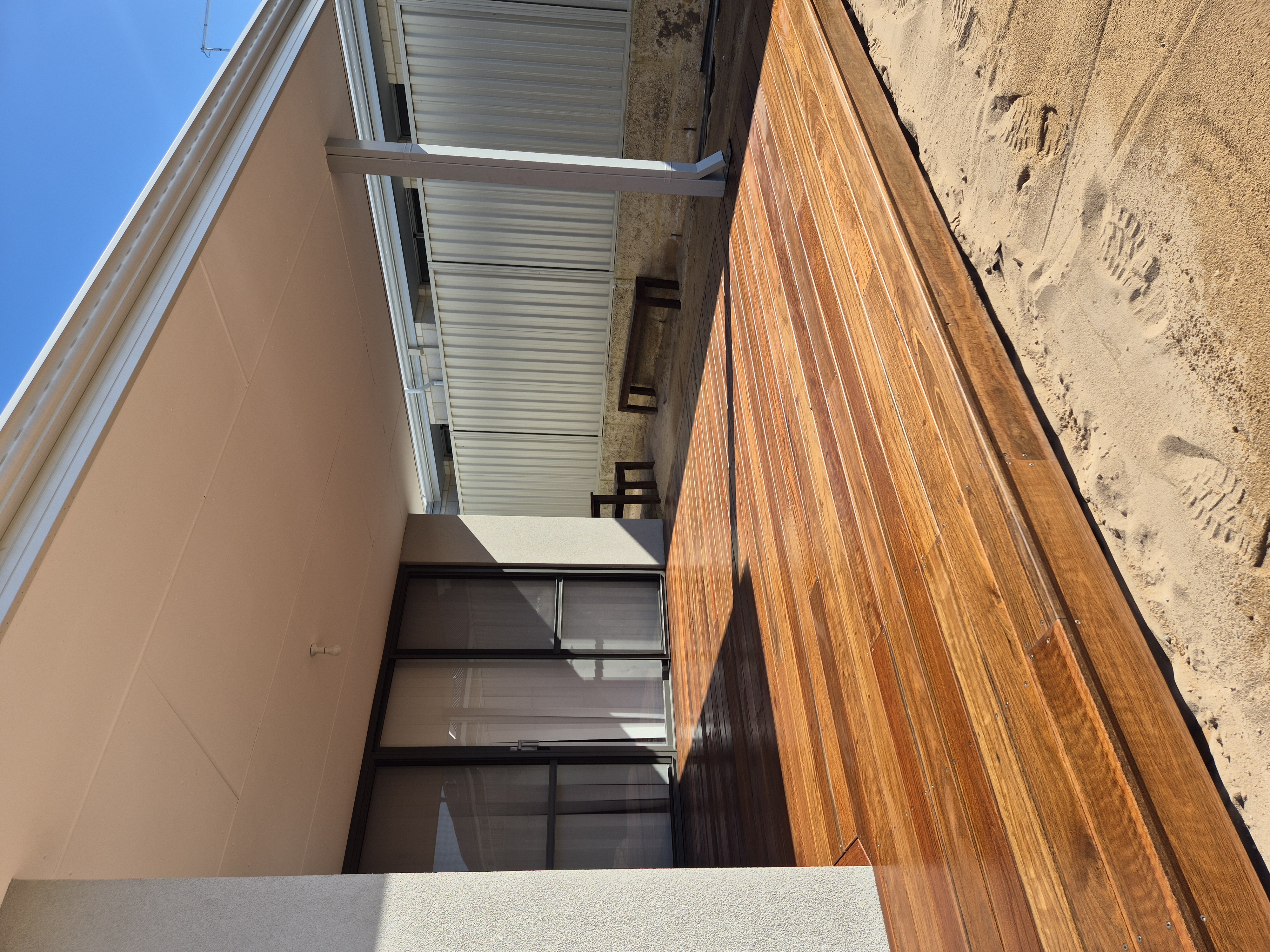 Spotted Gum decking board — distinctive flame grain, light to dark colour variation